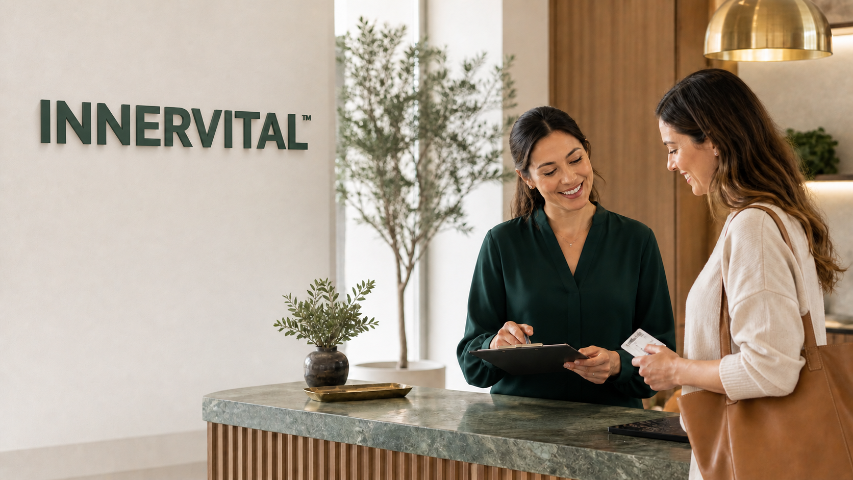 Warm clinic reception area for a future patient insurance benefits conversation
